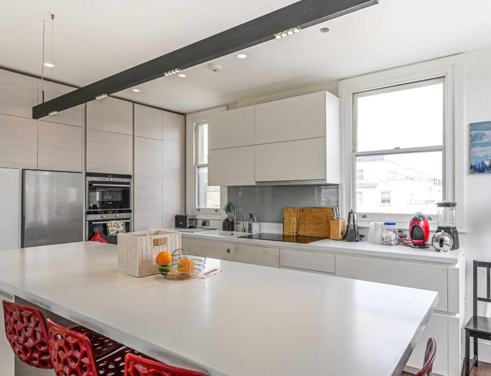 Kitchen or kitchenette, dishwasher, oven, stove, toaster