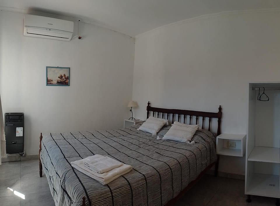 Bed, Photo of the whole room, Bedroom, towels, air conditioner