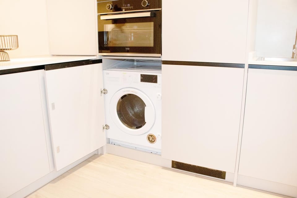 Kitchen or kitchenette, washing machine