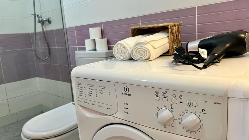 Bathroom, towels, washing machine