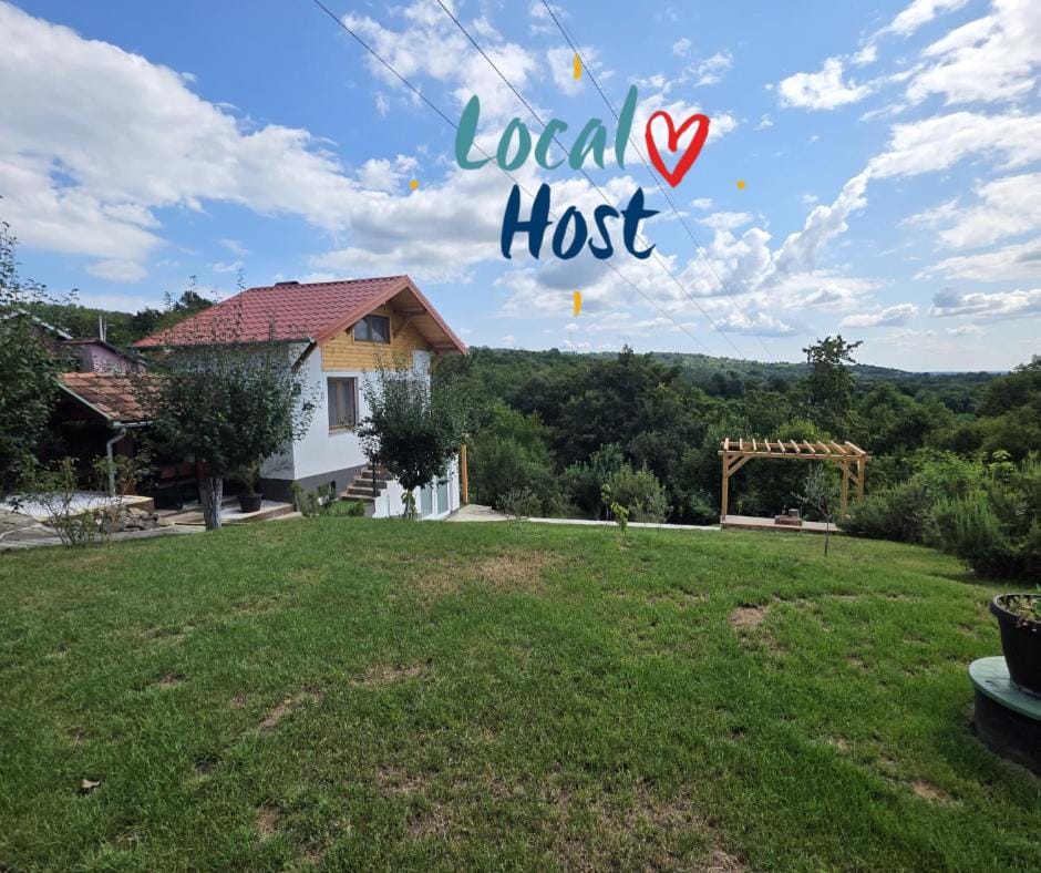 Property building, Spring, Day, Property logo or sign, Natural landscape, Garden, Logo/Certificate/Sign, Text overlay, Garden view, Mountain view, Certificate/Award