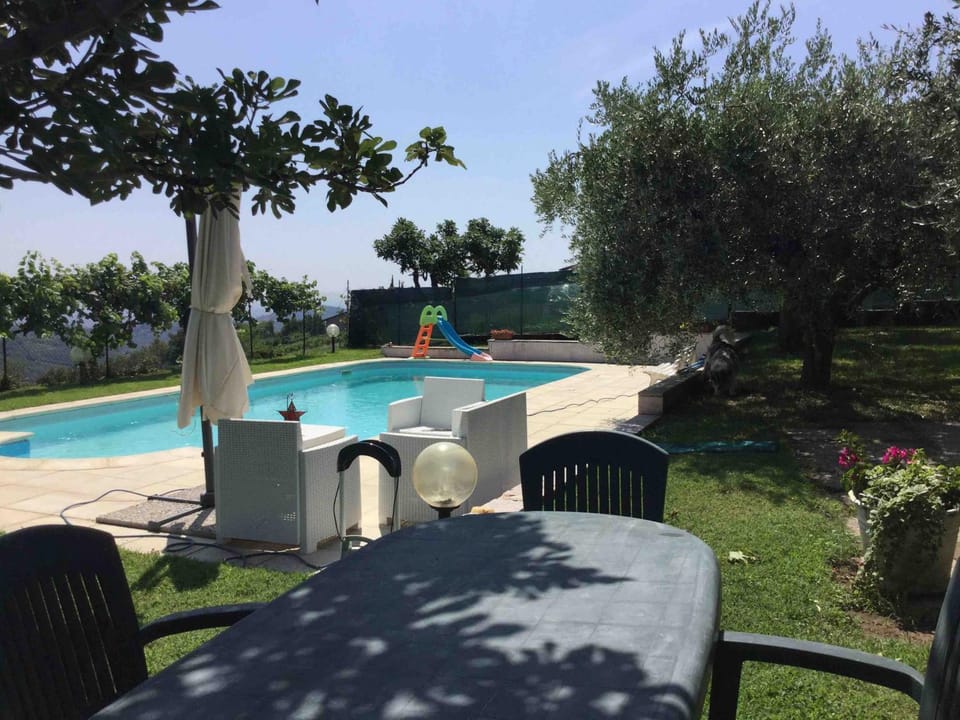 Property building, Living room, Swimming pool