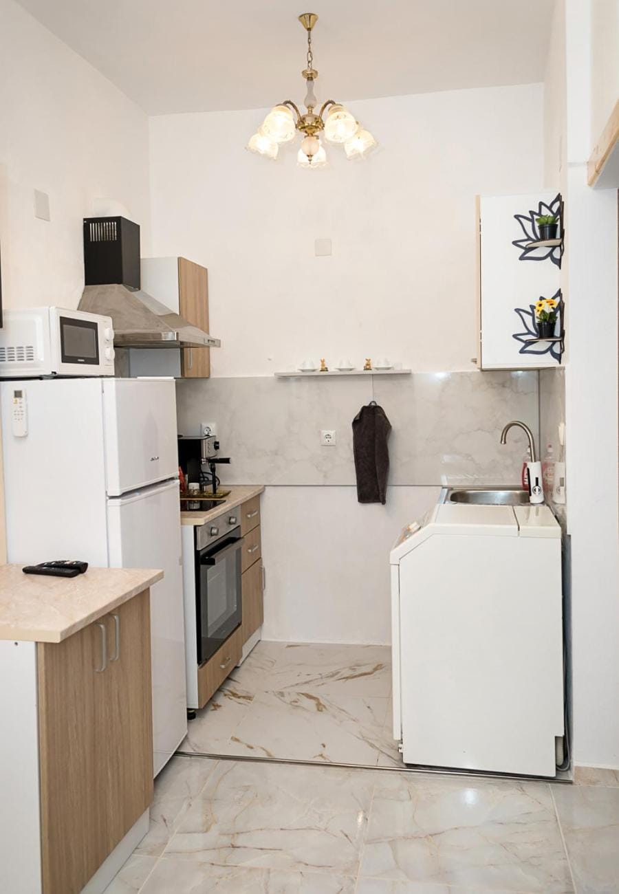 microwave, oven, stove, washing machine, kitchen