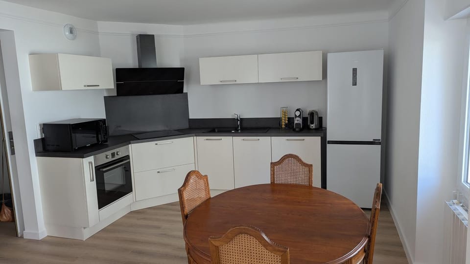 Dining area, dishwasher, oven, stove