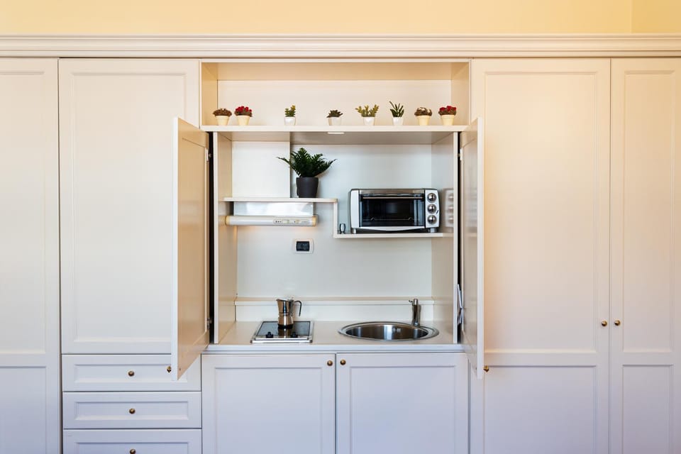 Kitchen or kitchenette, stove