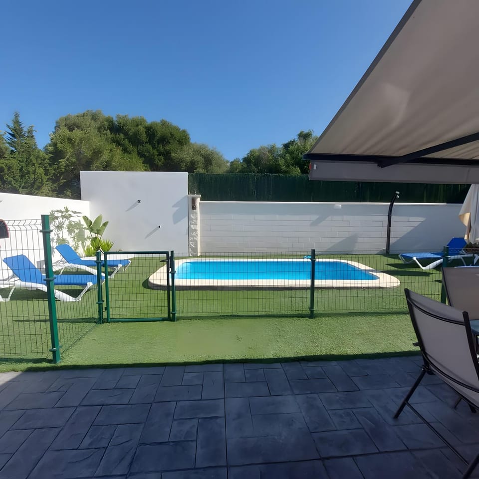 Property building, Living room, Swimming pool