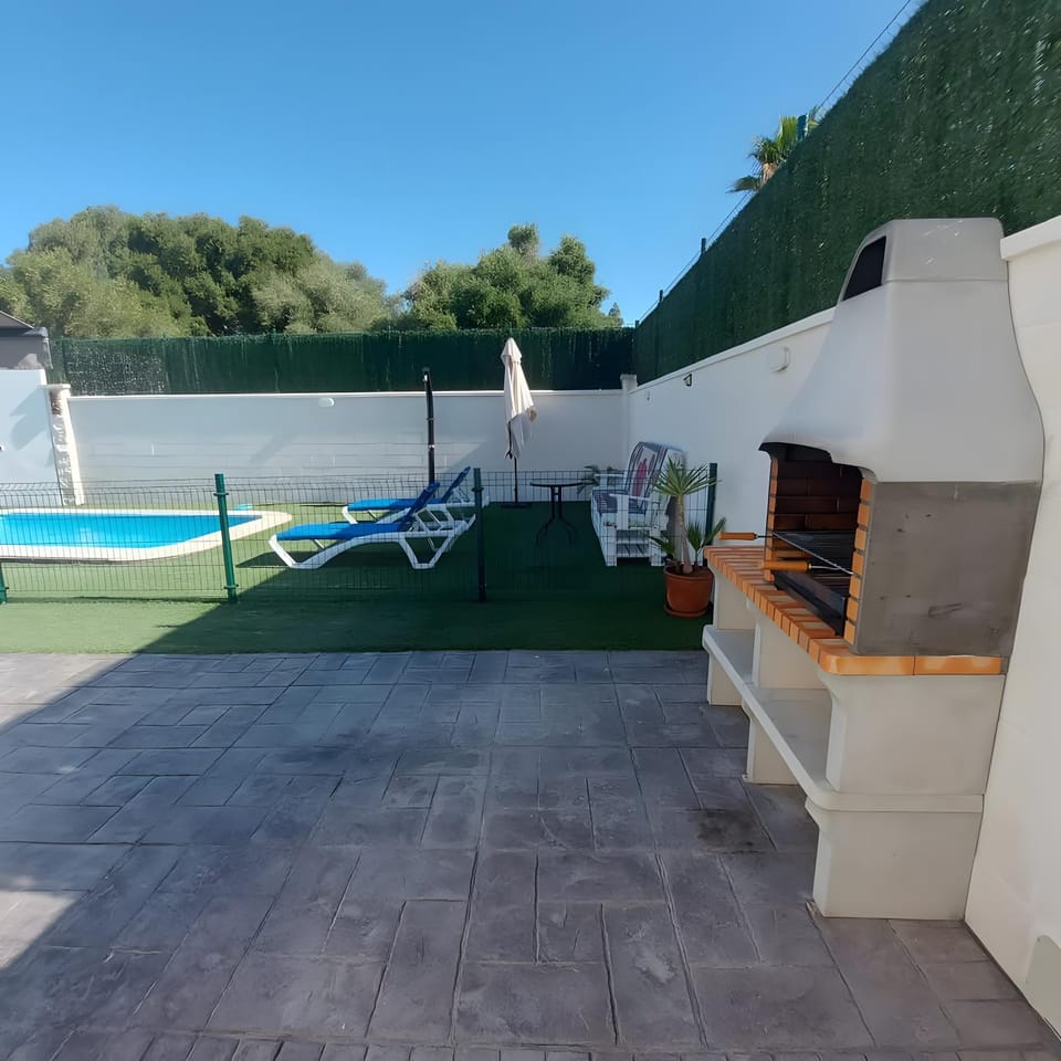 Property building, Living room, Swimming pool