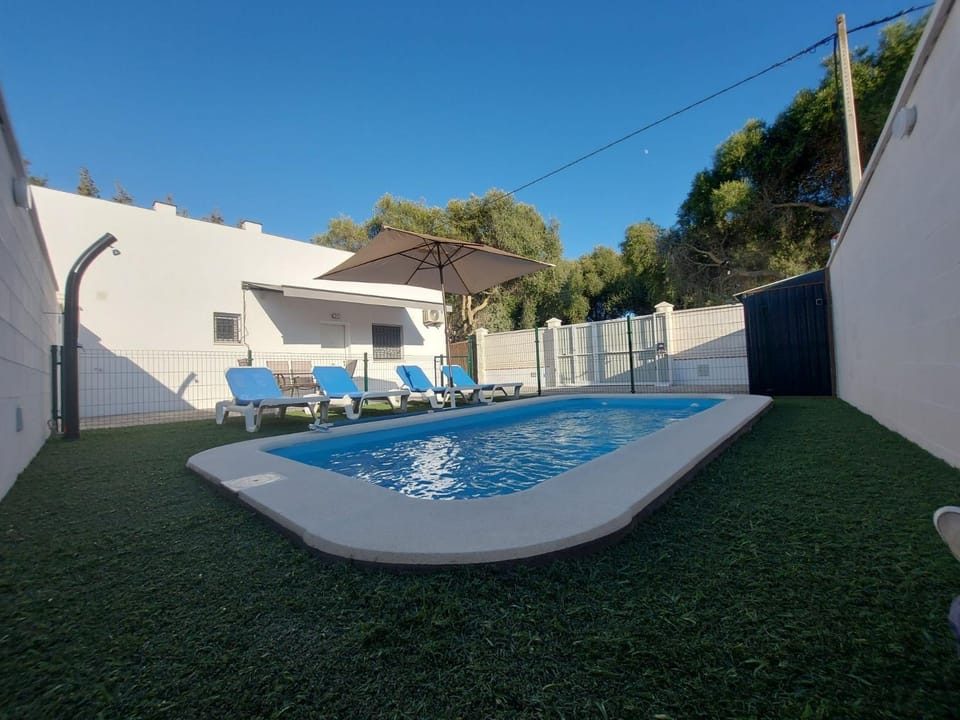 Property building, Living room, Swimming pool