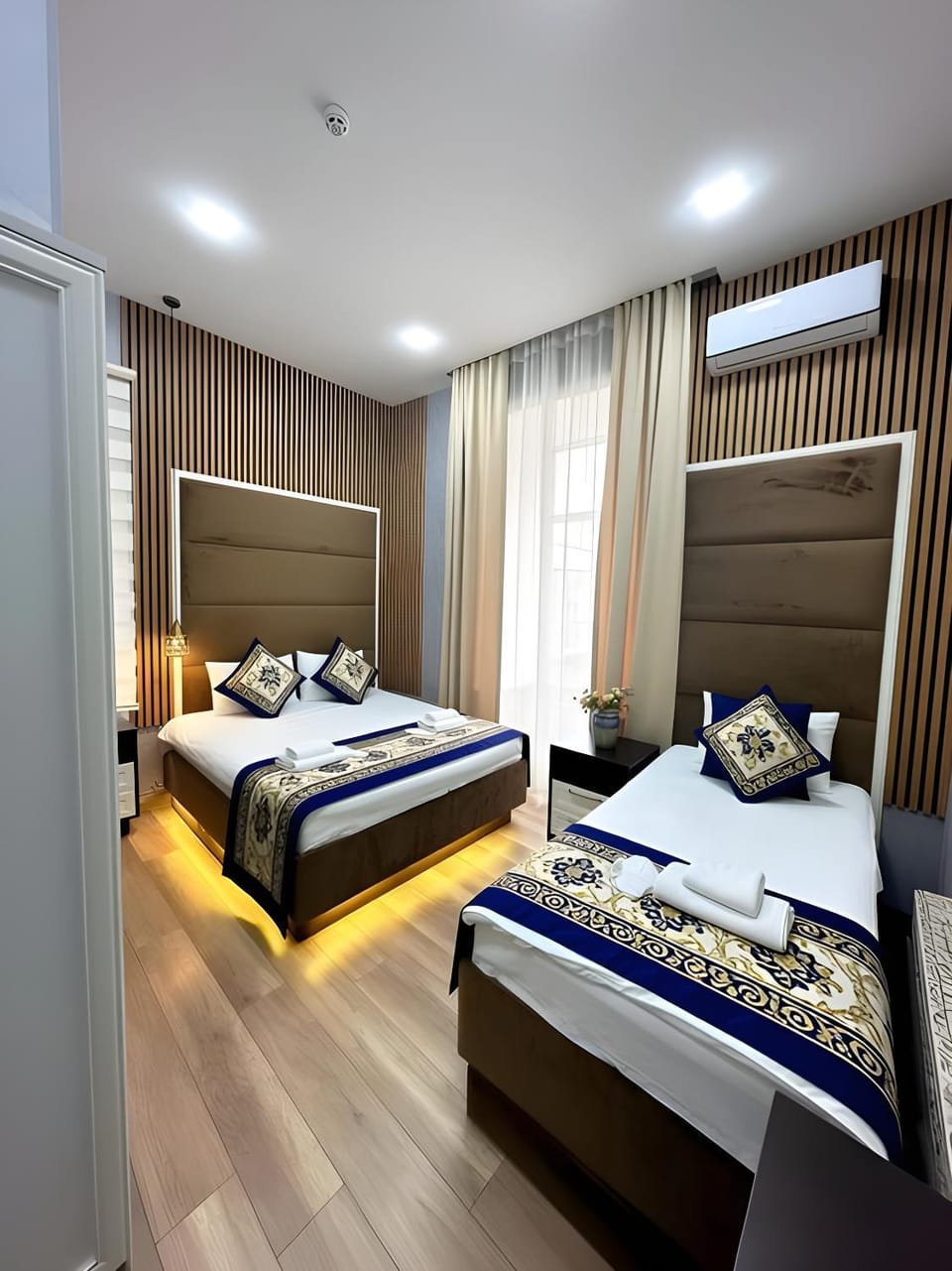 Bed, Photo of the whole room, Bedroom, towels, air conditioner