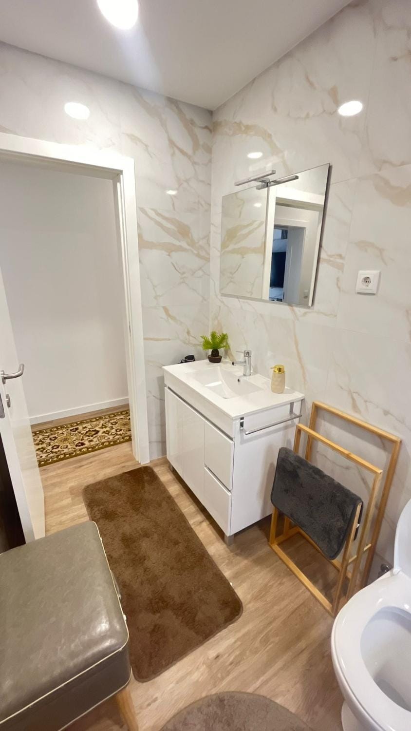 Toilet, Bathroom, Facility for disabled guests, hair dryier, towels