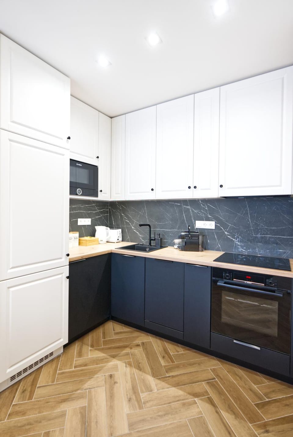 Kitchen or kitchenette, dishwasher, stove, toaster