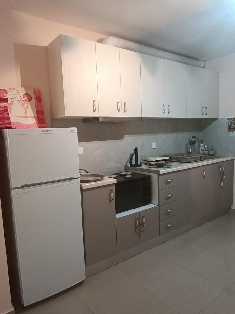 Kitchen or kitchenette, oven, stove