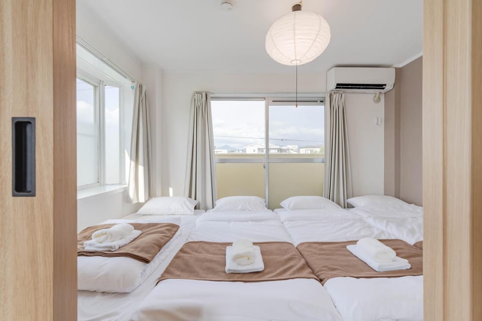 Bed, Photo of the whole room, Bedroom, towels, air conditioner