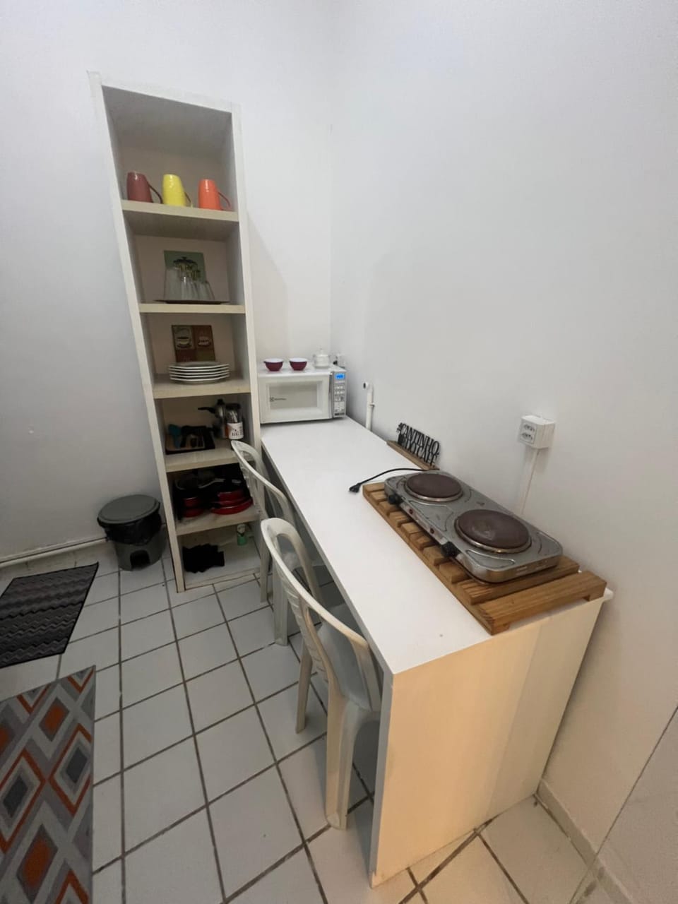 Kitchen or kitchenette, microwave, stove
