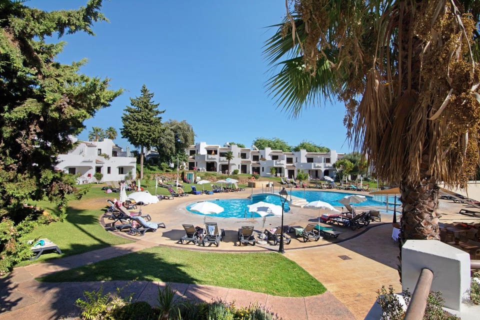 Property building, Living room, Swimming pool