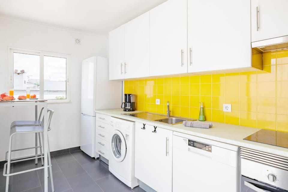 Kitchen or kitchenette, Dining area, dishwasher, oven, stove, washing machine