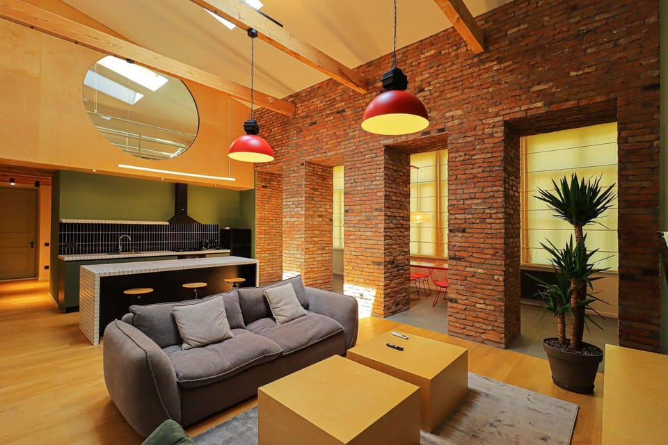 Unique Designer Loft with Mezzanine Bedroom - Wehost Apartment in Tbilisi, Georgia