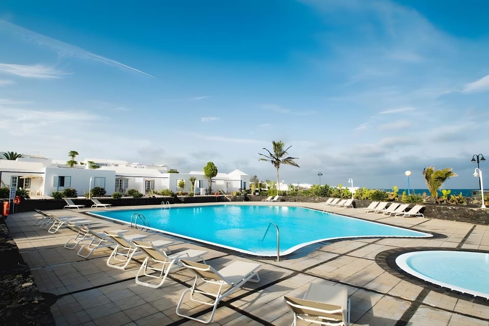 Property building, Living room, Swimming pool