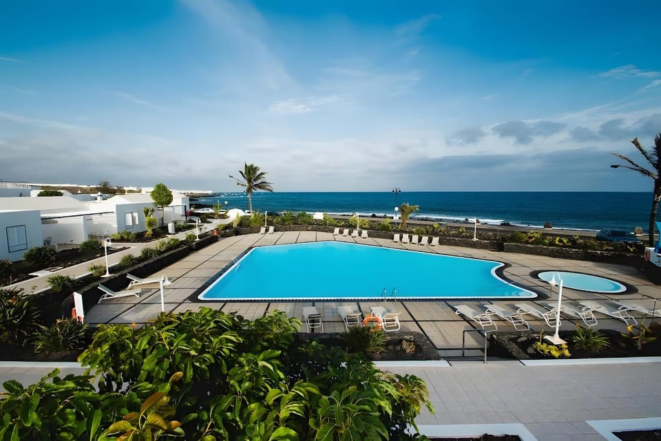 Property building, Living room, Swimming pool