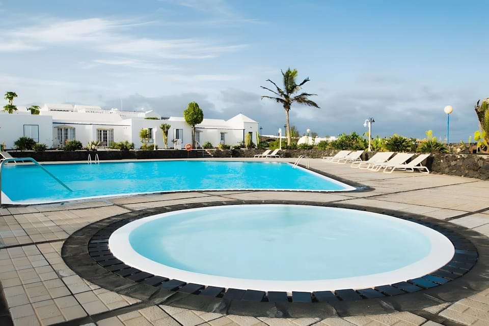 Property building, Living room, Swimming pool