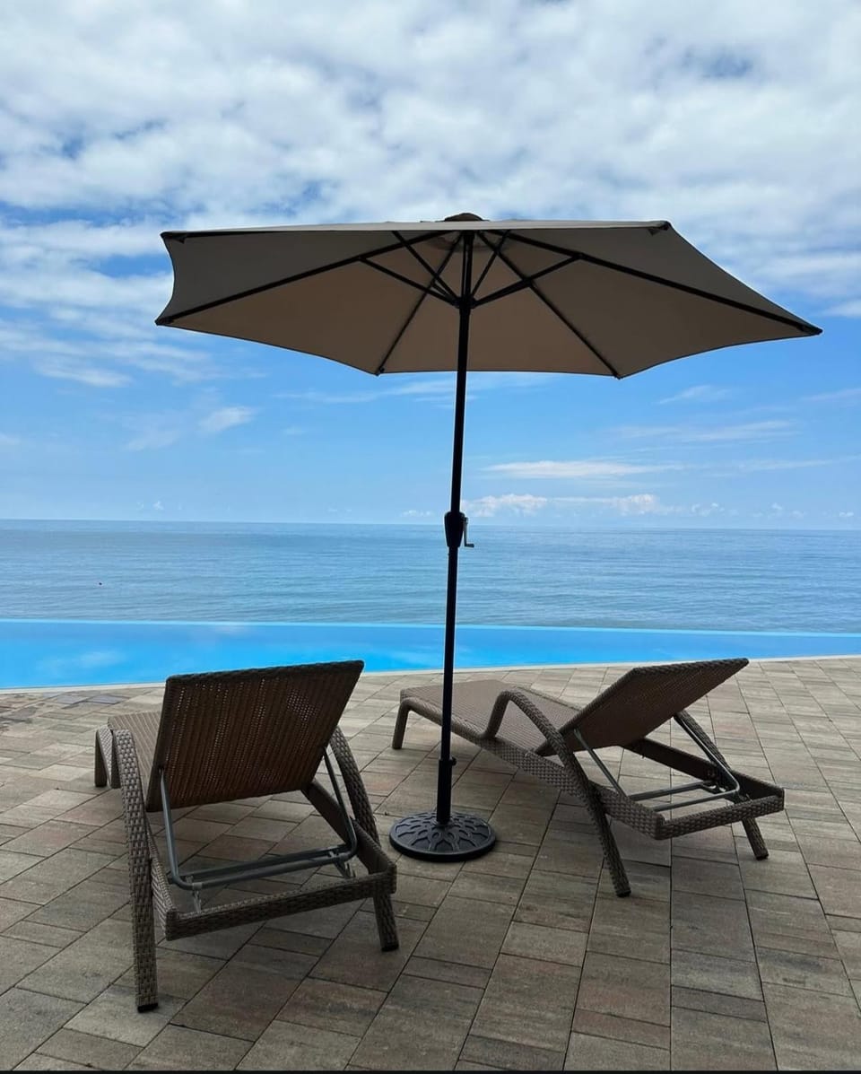 View (from property/room), Pool view, Sea view, Swimming pool