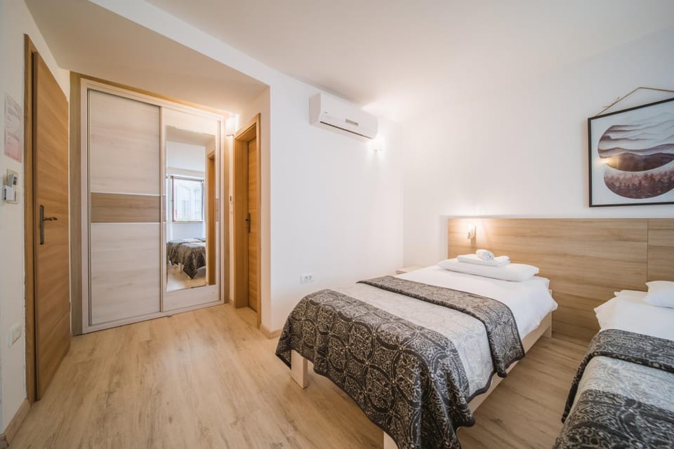 Bed, Photo of the whole room, Bedroom, towels, air conditioner