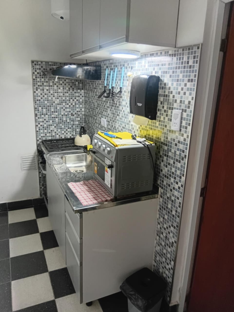 Kitchen or kitchenette, oven, stove