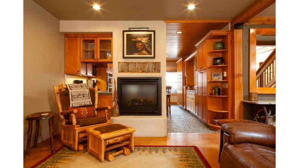 Living room, Seating area, fireplace, furniture, air conditioner