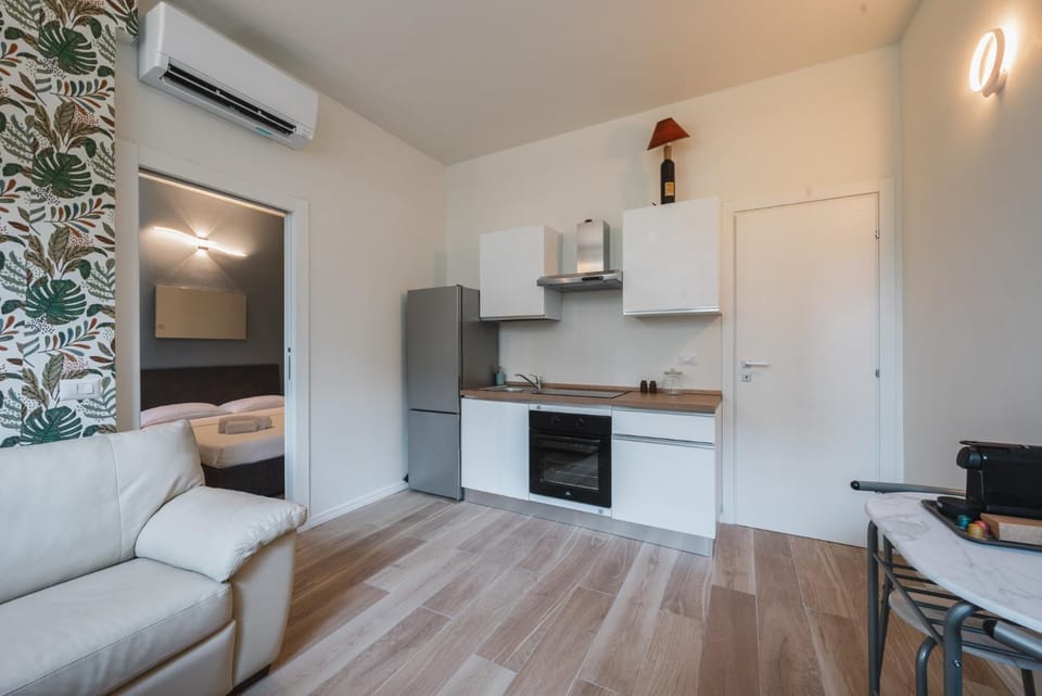 Kitchen or kitchenette, Living room, Seating area, Dining area, oven, stove, air conditioner