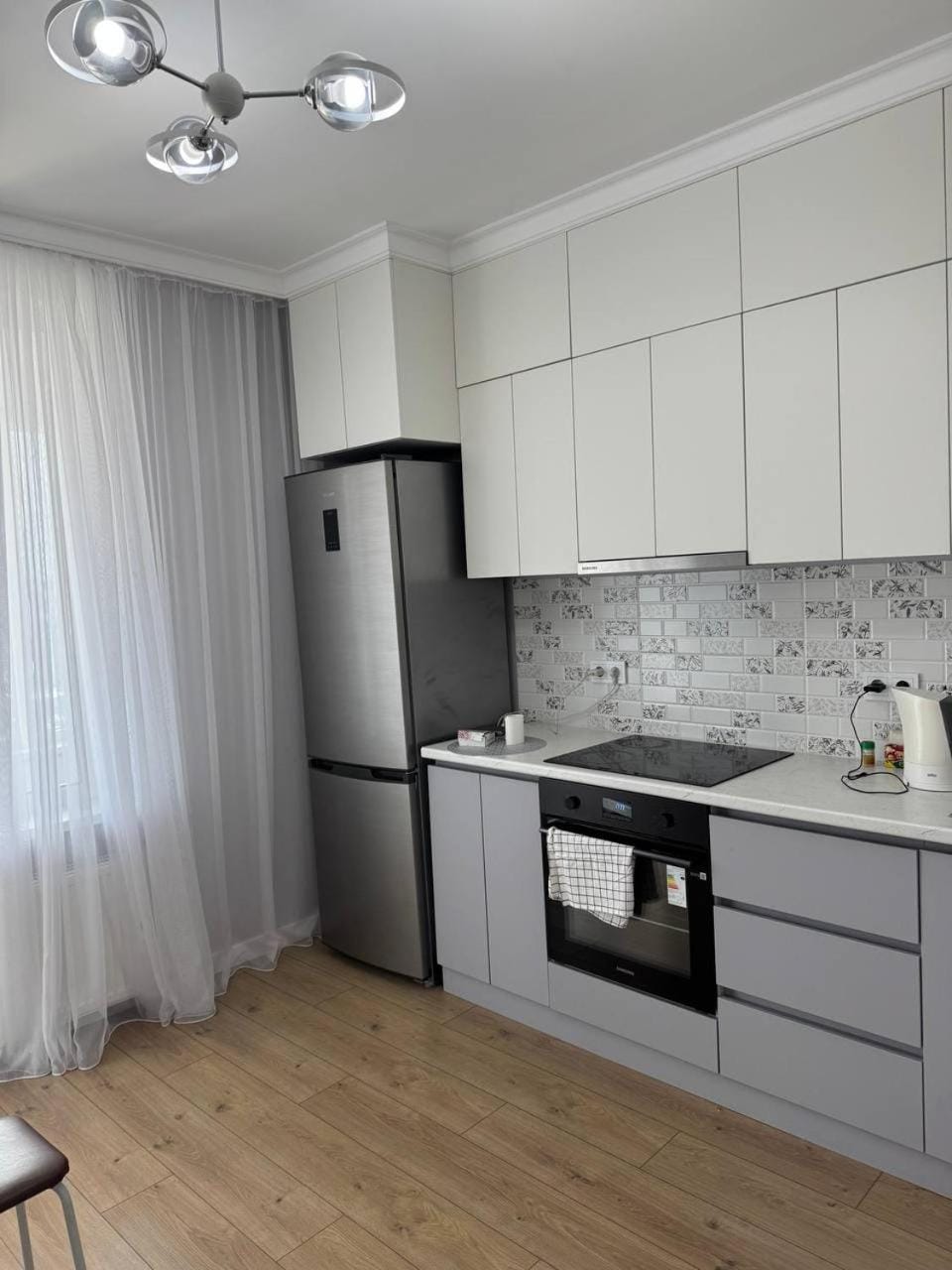 Kitchen or kitchenette, oven, stove