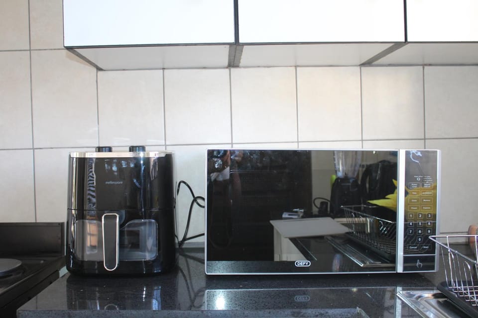 Kitchen or kitchenette, microwave