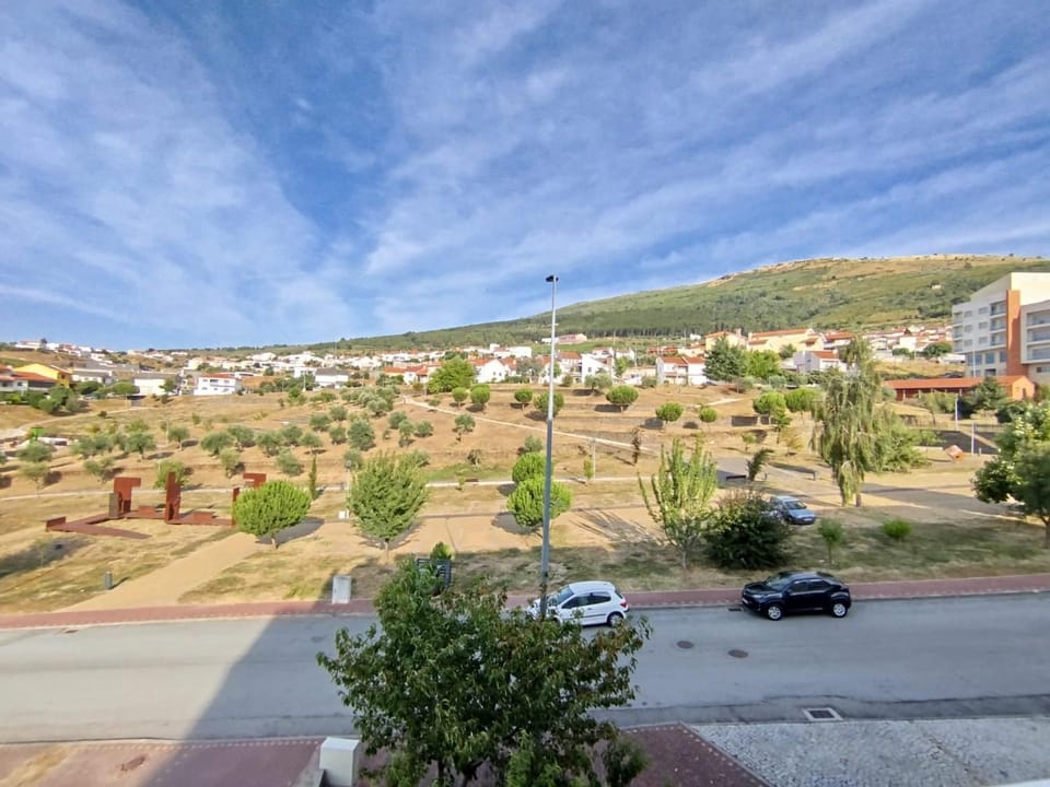 Day, Neighbourhood, Natural landscape, City view, Mountain view, Street view, Location, Parking