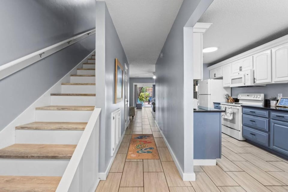 Kitchen or kitchenette, dishwasher, oven, stove