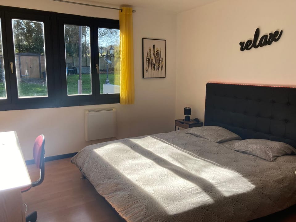 Appartement T3 dans pavillon avec terrasse et jardin Apartment in Grand Est
