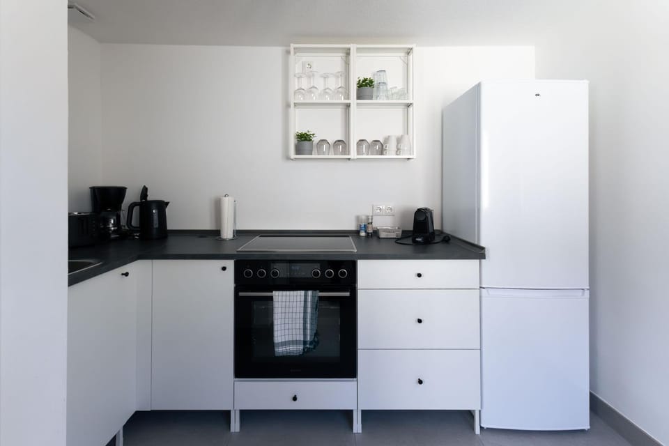 Kitchen or kitchenette, oven, stove