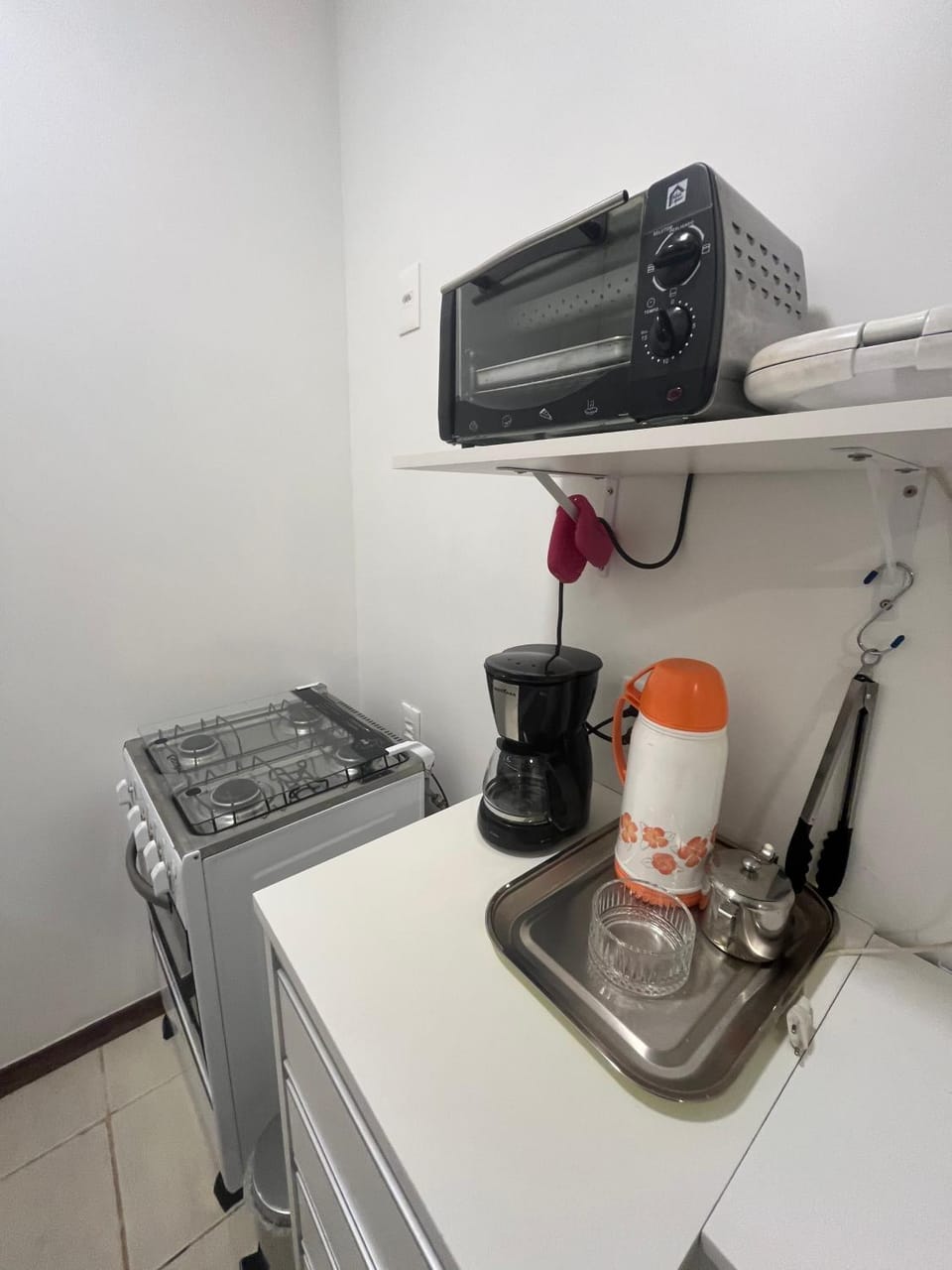 Kitchen or kitchenette, stove, toaster