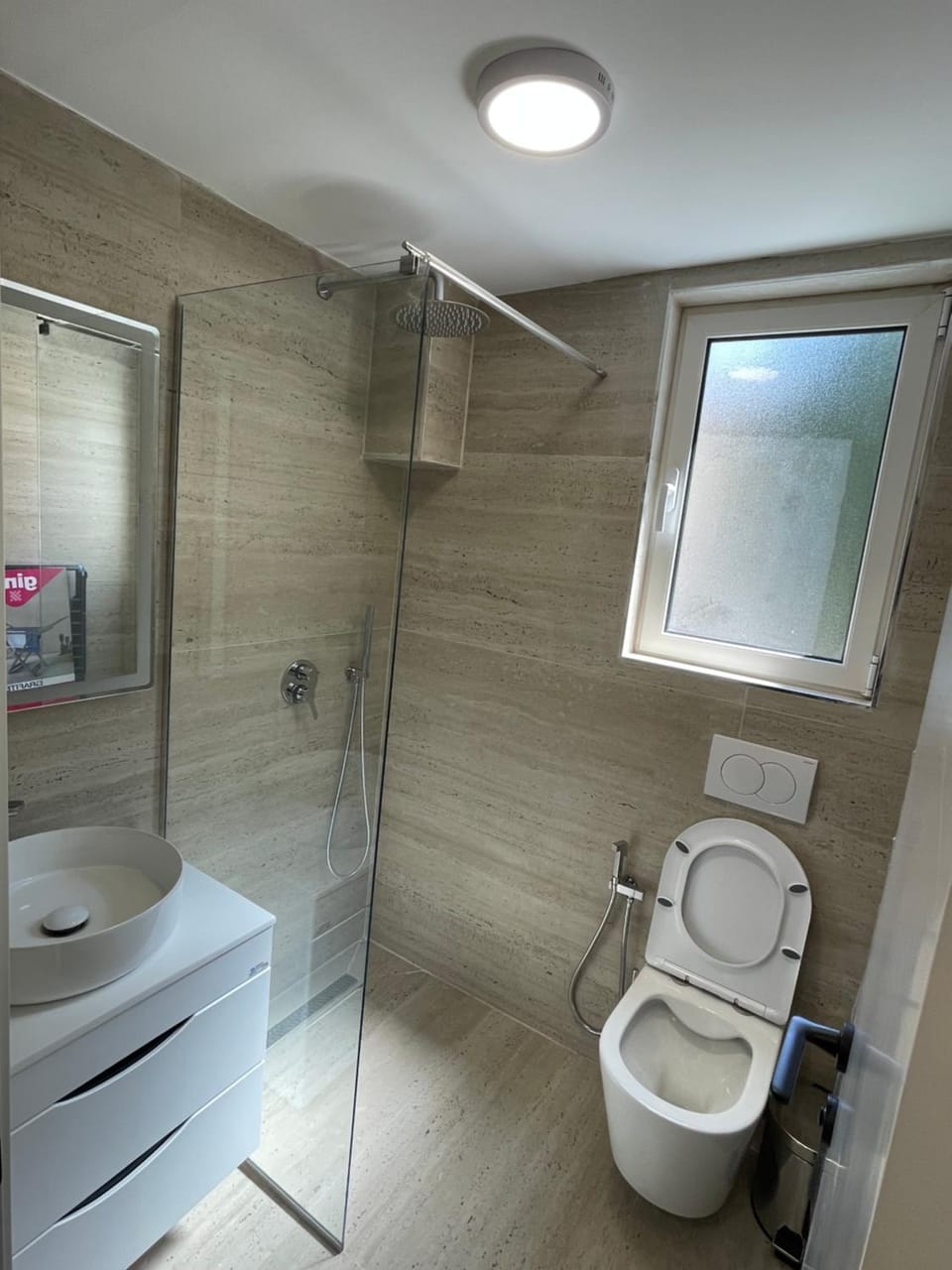 Shower, Toilet, hair dryier, towels