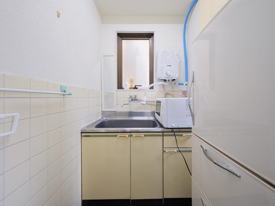Kitchen or kitchenette, microwave