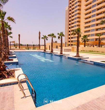 Property building, Day, Pool view, Swimming pool, sunbed