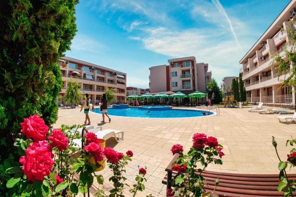 Property building, Communal lounge/ TV room, Garden, Pool view