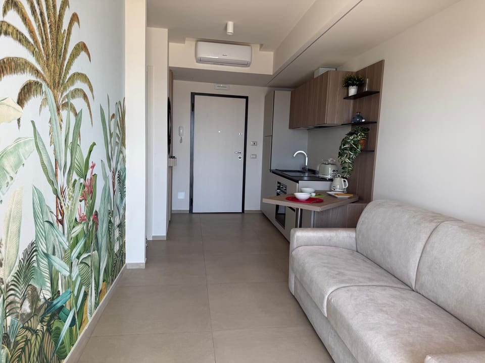 Kitchen or kitchenette, Living room, Seating area, Dining area, air conditioner