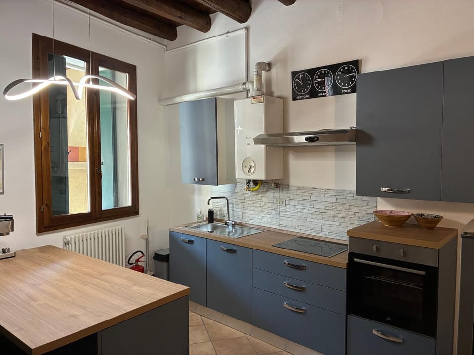 Kitchen or kitchenette, oven, stove