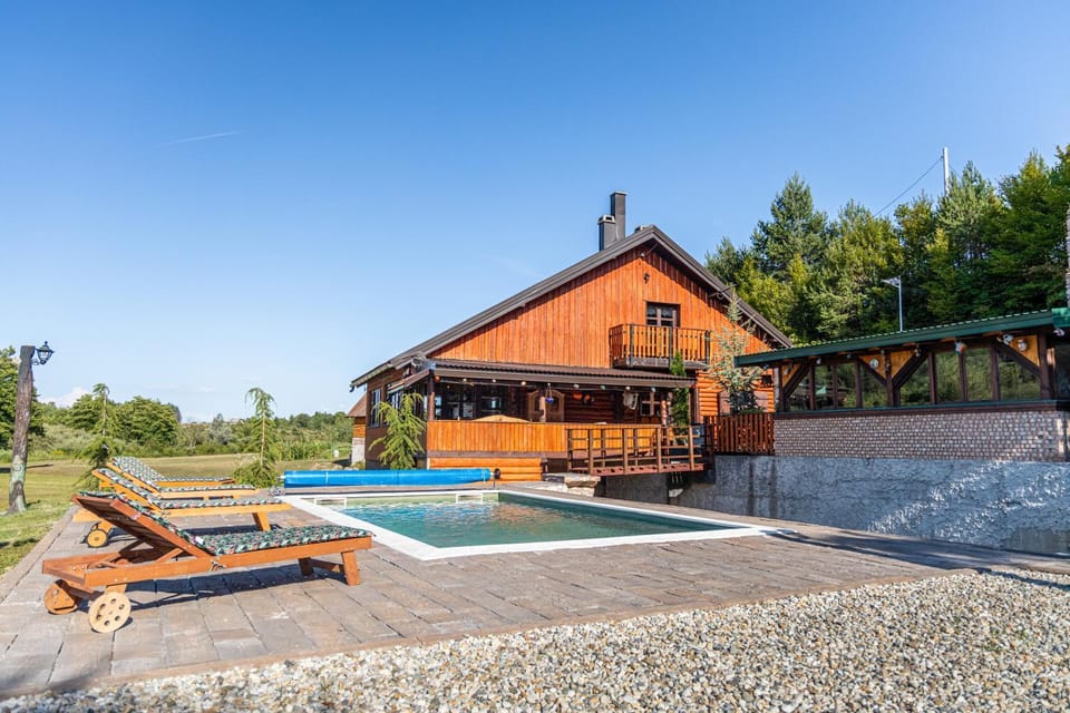 Property building, Day, Natural landscape, Pool view, Swimming pool, sunbed