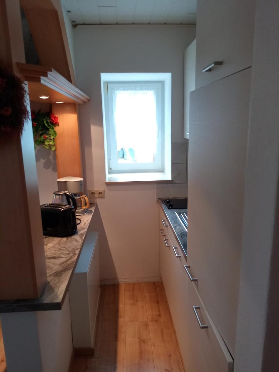 Kitchen or kitchenette, stove