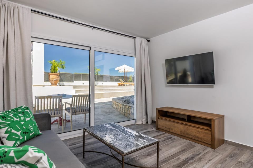 Patio, Facade/entrance, View (from property/room), Living room, Seating area, Inner courtyard view