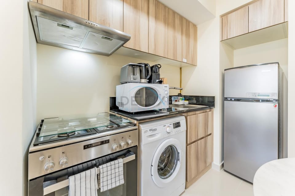 microwave, oven, stove, toaster, washing machine, kitchen
