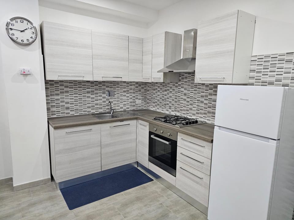 Kitchen or kitchenette, oven, stove