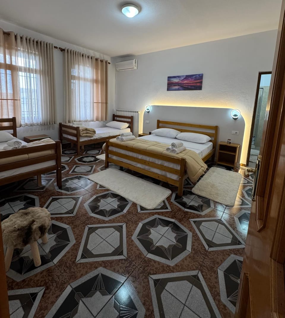 Shower, Toilet, Bed, Photo of the whole room, Seating area, towels, air conditioner