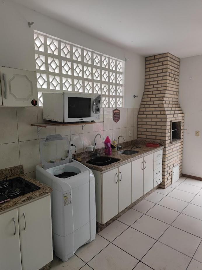 Kitchen or kitchenette, washing machine