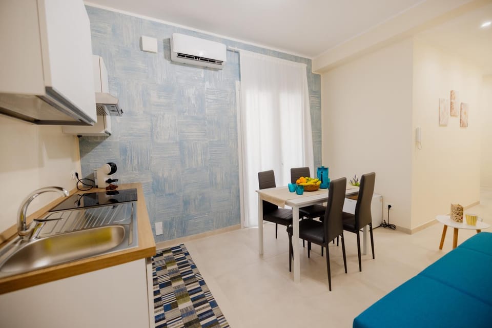 Kitchen or kitchenette, Living room, Seating area, Dining area, air conditioner